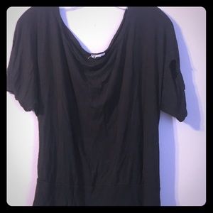 Black shirt loose and stretchy.